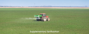 Tractor fertilizing field