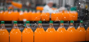 factory line of bottled drinks orange colour