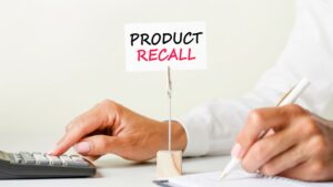 Product recall text on the white sticker in the shirt pocket.