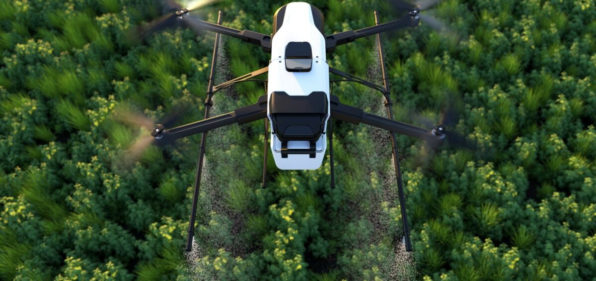 Drone spraying fertilizer on vegetable green plants agriculture technology farm automation